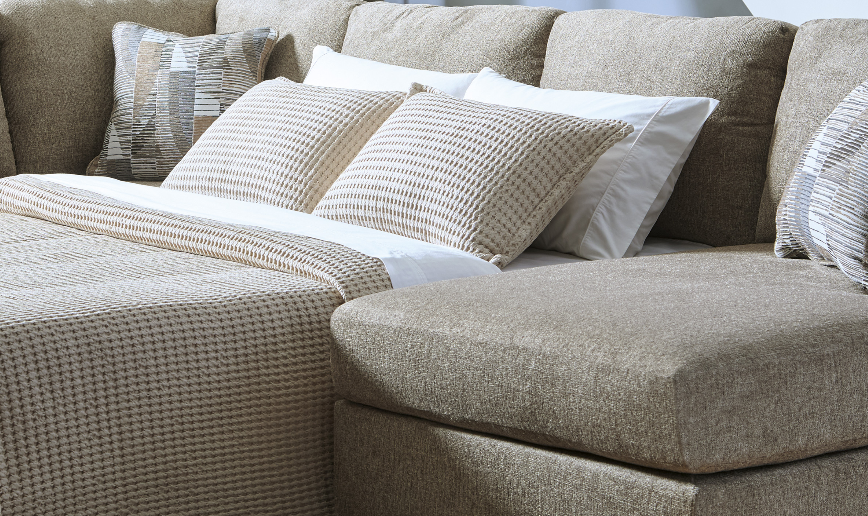 Modern Heritage Newellen 3‑Piece Sleeper Sectional with Double Chaise