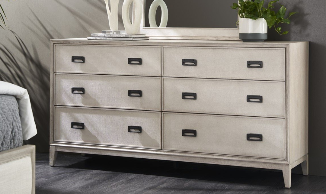 Place this dresser in a beautiful modern bedroom. The image should be horizontal, 3000 x 1784 and sharp-jennifer furniture