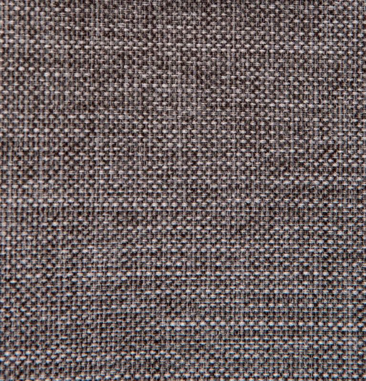 Patterned beige textile fabric close-up texture