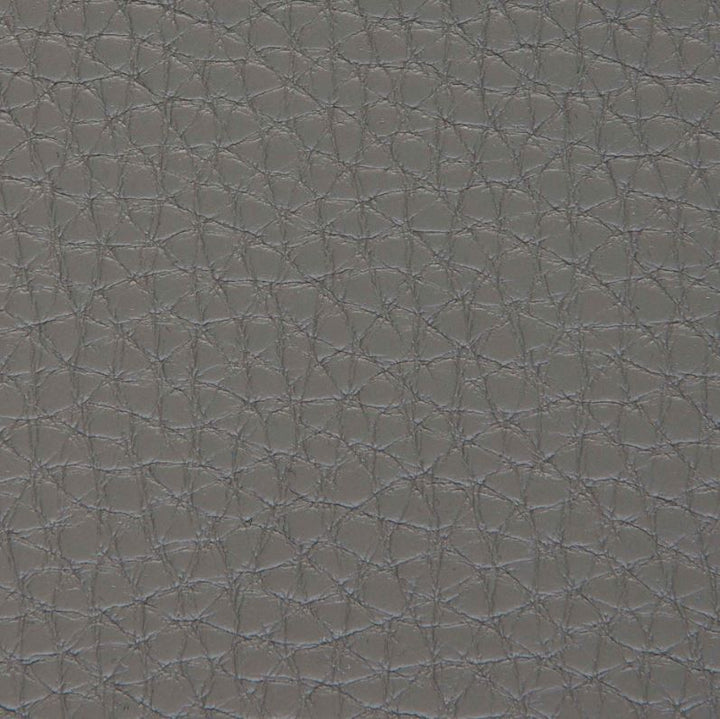 Close-up of gray upholstered bed fabric texture